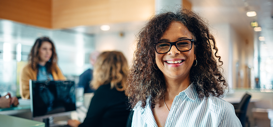 Happy office workers in an energy efficient office building